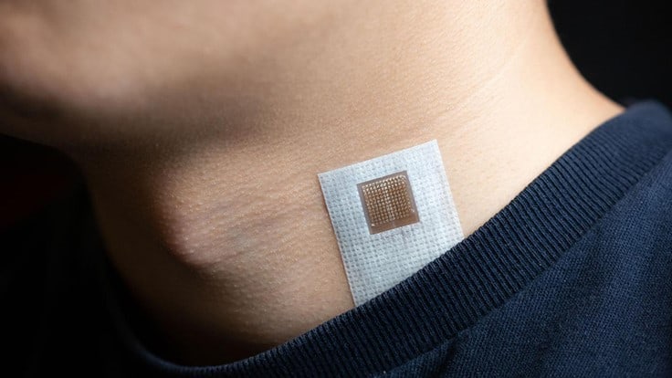 Ultrasound patch worn on the neck.