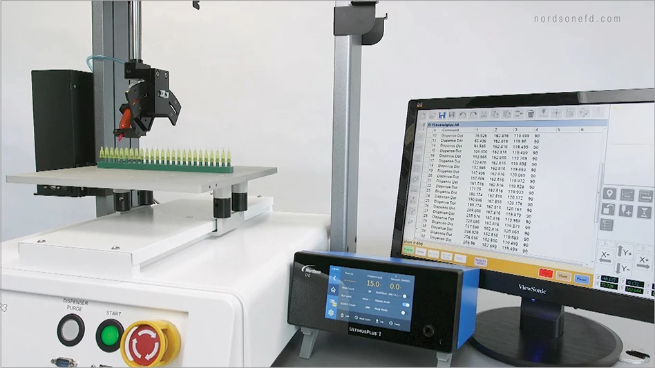 A computer next to machinery