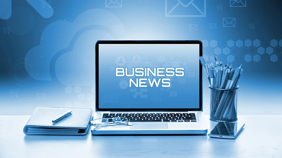 open laptop with words business news